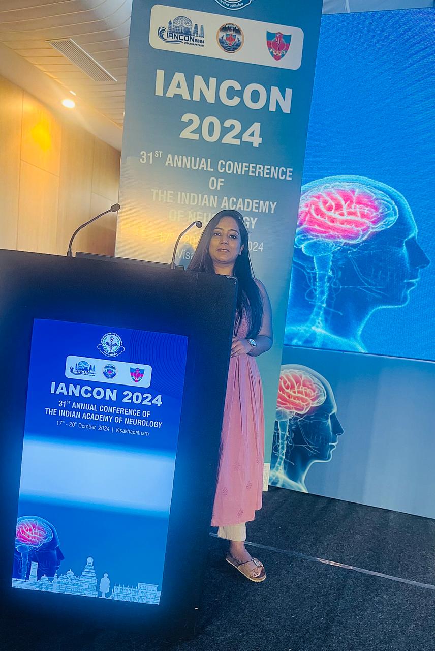 Dr. Siphora presenting on neurological conditions at a national conference